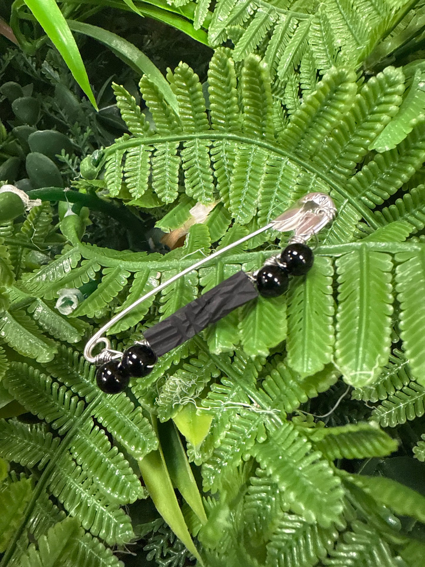 Seguro con Obcidiana y Azabache