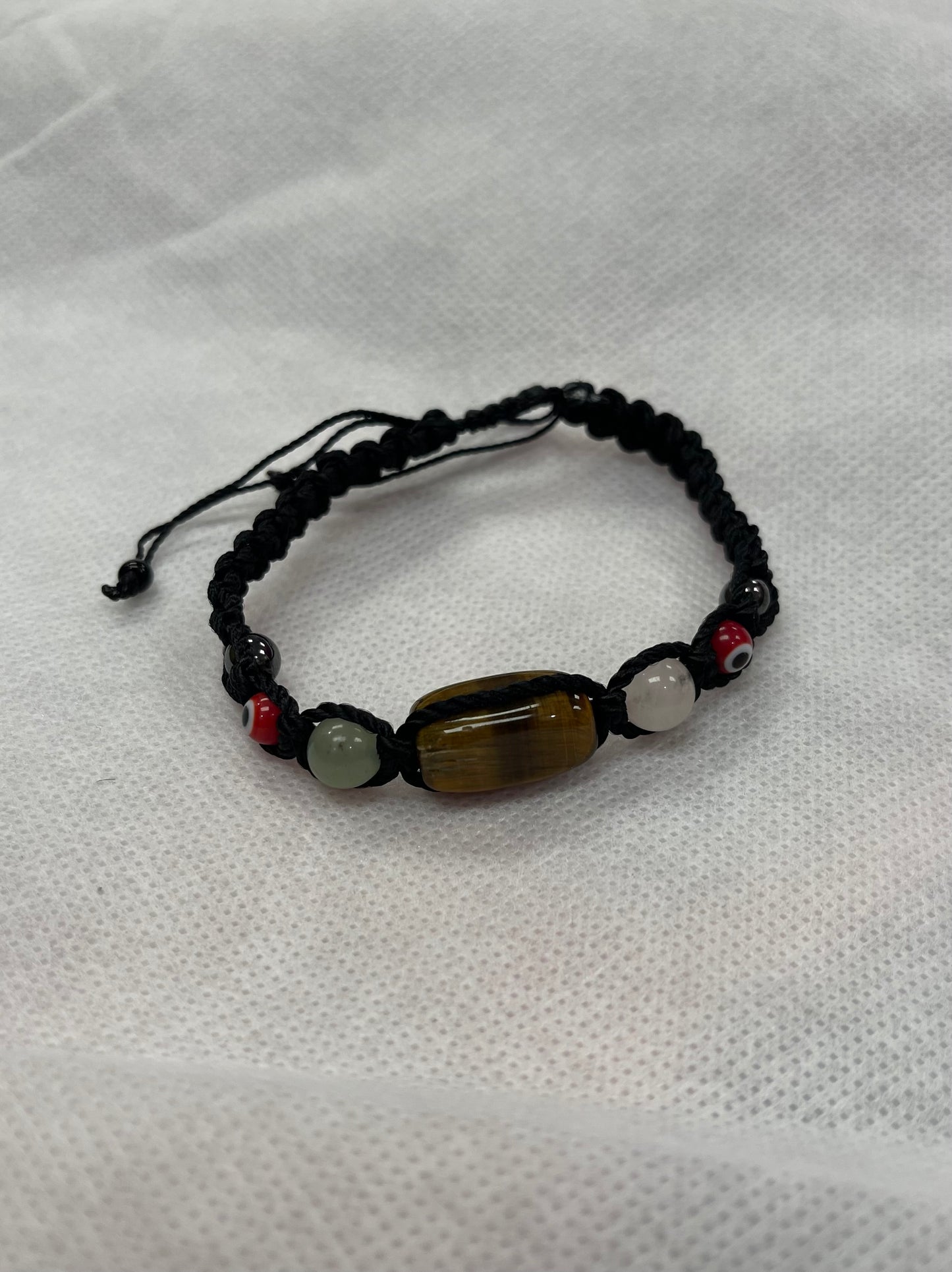 Pulsera 5 protecciones Hilo negro ojo de Tigere
