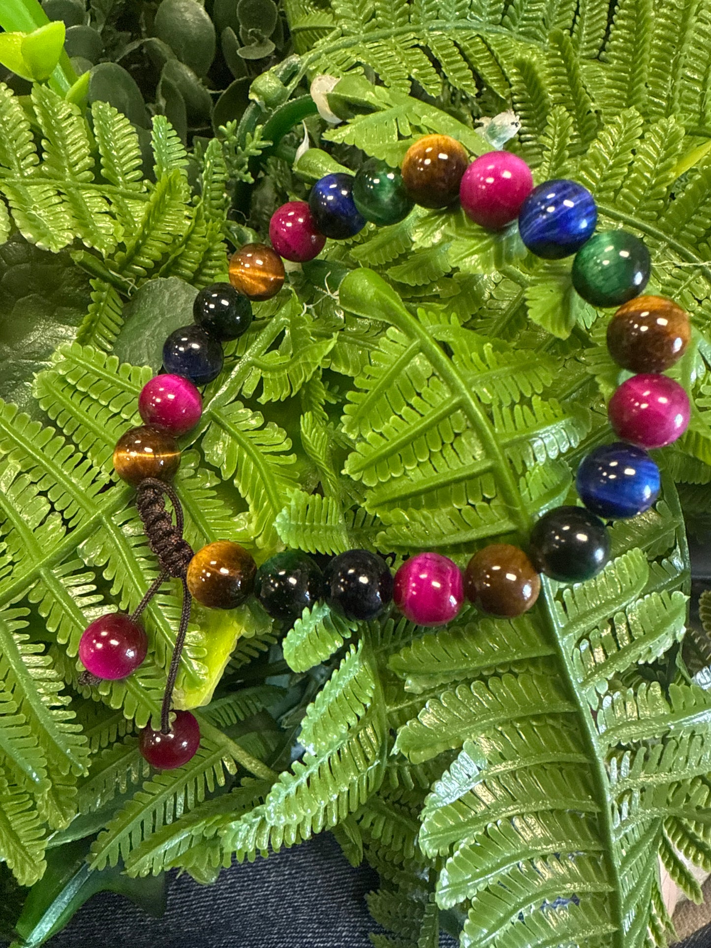 Pulcera ojo de gato multi color de hilo