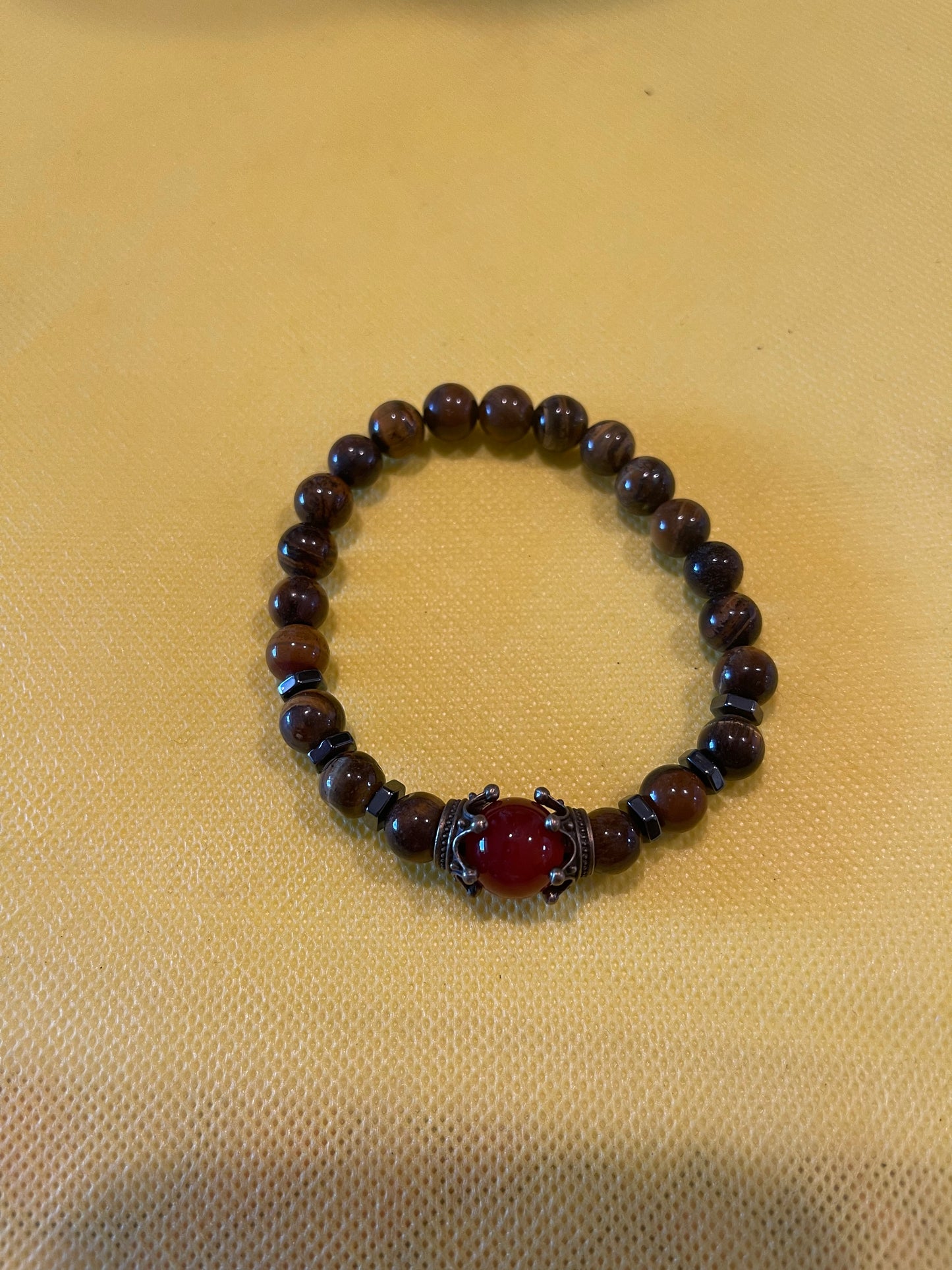 Pulcera Corona ojo de tigere