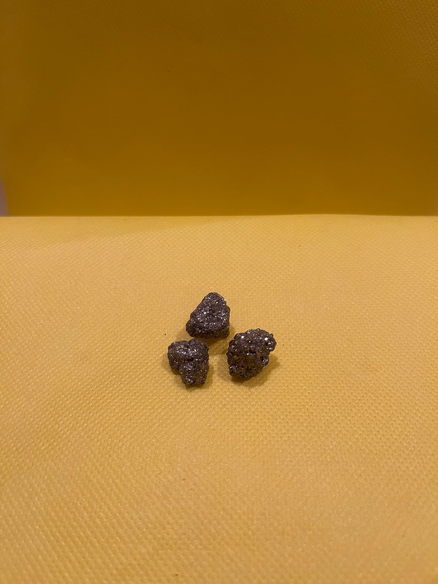 Tres de pirita para bolsillo