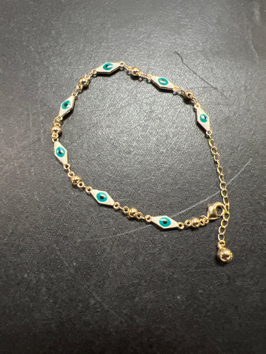 Tobillera oro laminado ojo turco largo