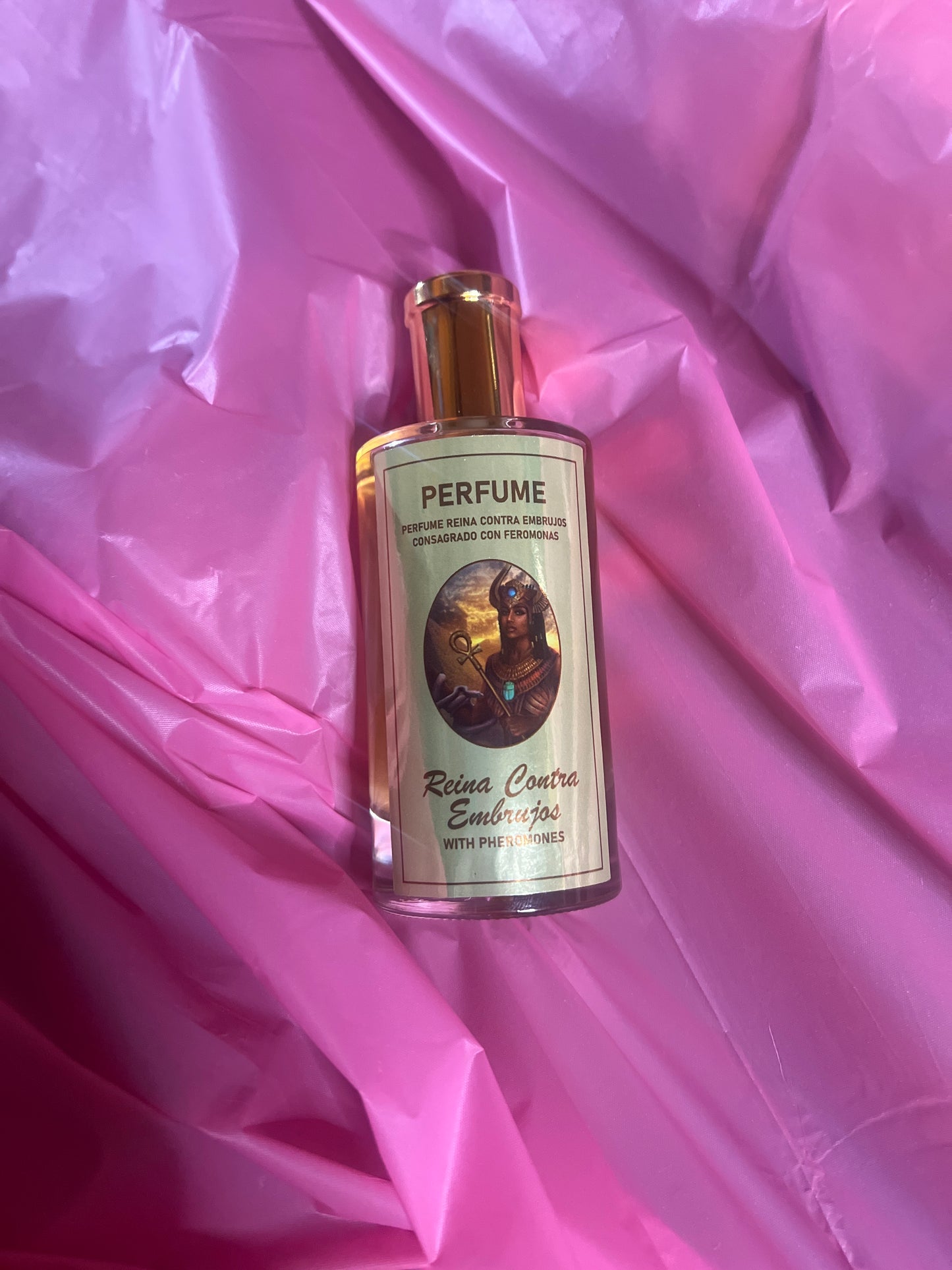 Perfume dorado Reyna contra embrujo