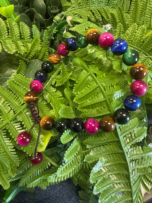Pulcera ojo de gato multi color de hilo